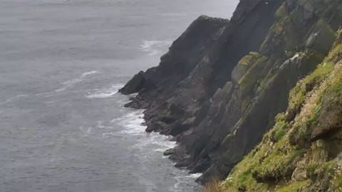 Wide view of Sumburgh Head cliffs under a Shetland sky